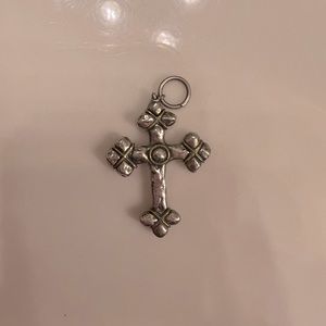 Waxing Poetic mixed metal cross charm.